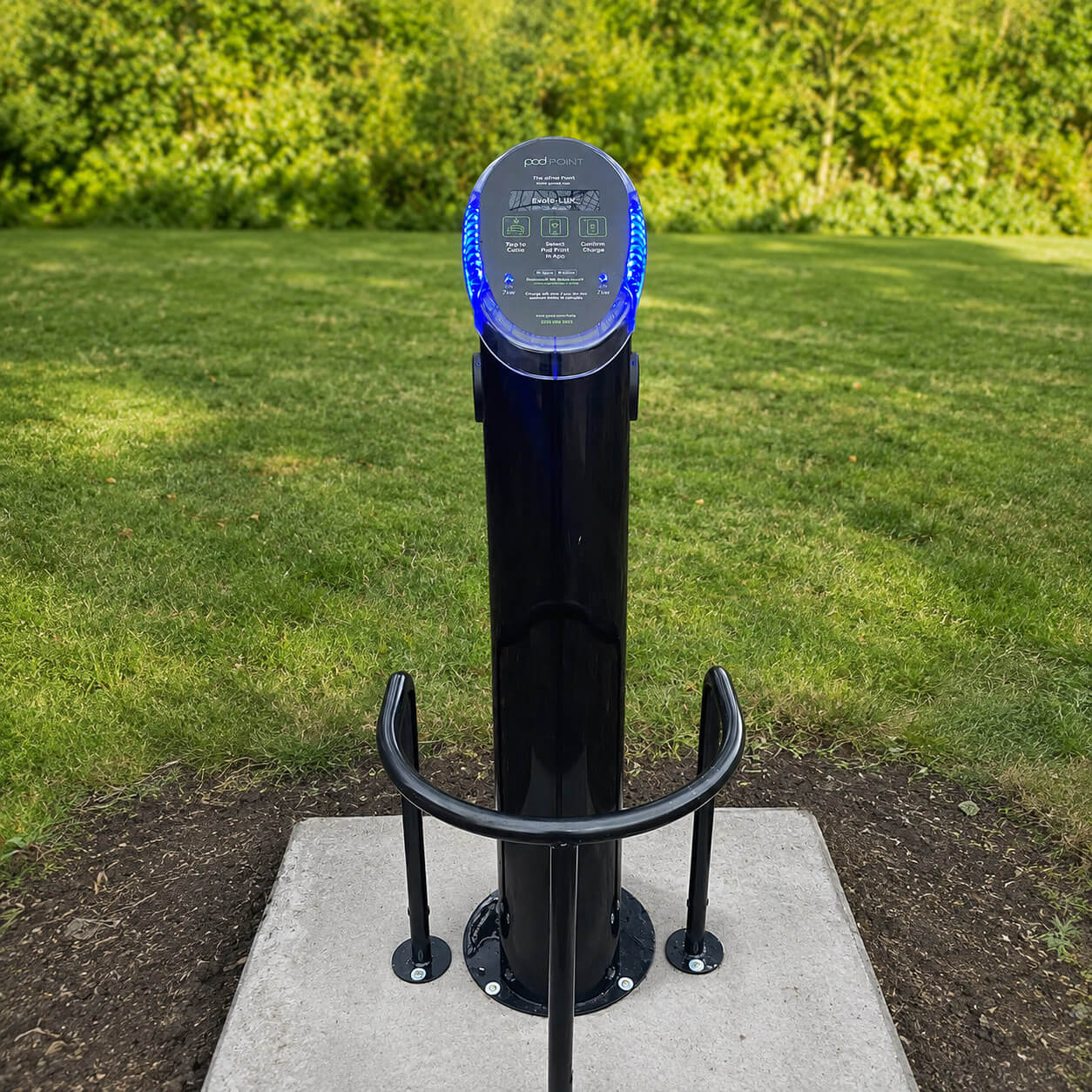 Wall-mounted EV charge point charging an electric car